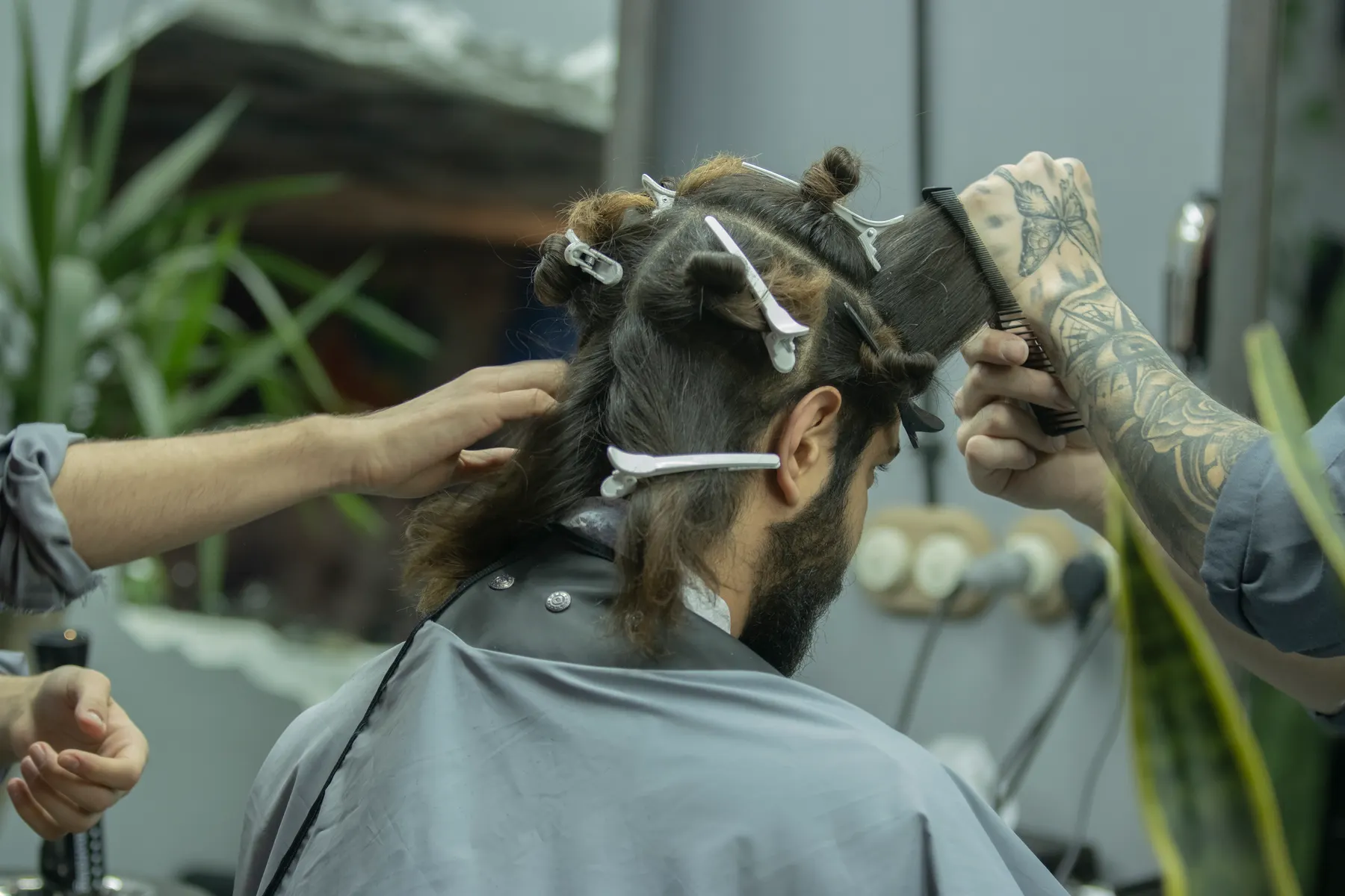 Hair sectioned and clipped up partway through a color service